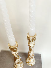 Load image into Gallery viewer, Two Ivory Candlesticks With Gold Leaf Detail
