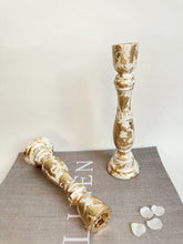 Load image into Gallery viewer, Two Ivory Candlesticks With Gold Leaf Detail
